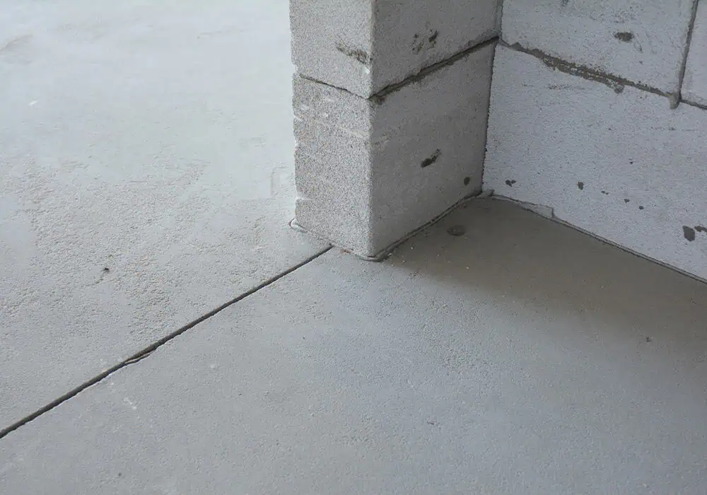 A concrete subfloor with minor imperfections