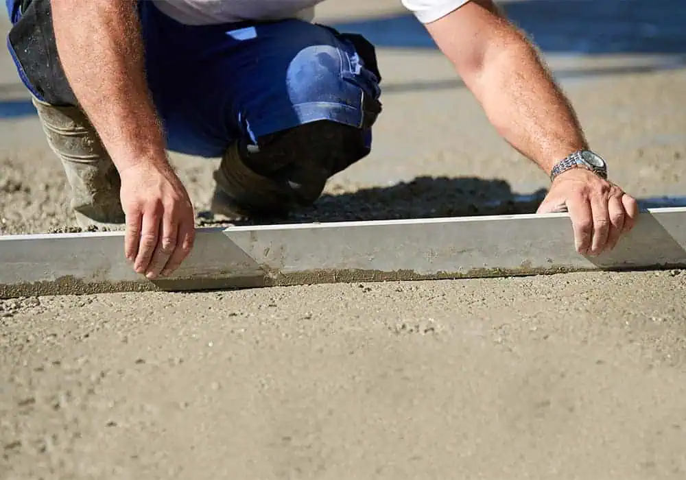 Man leveling a concrete subfloor