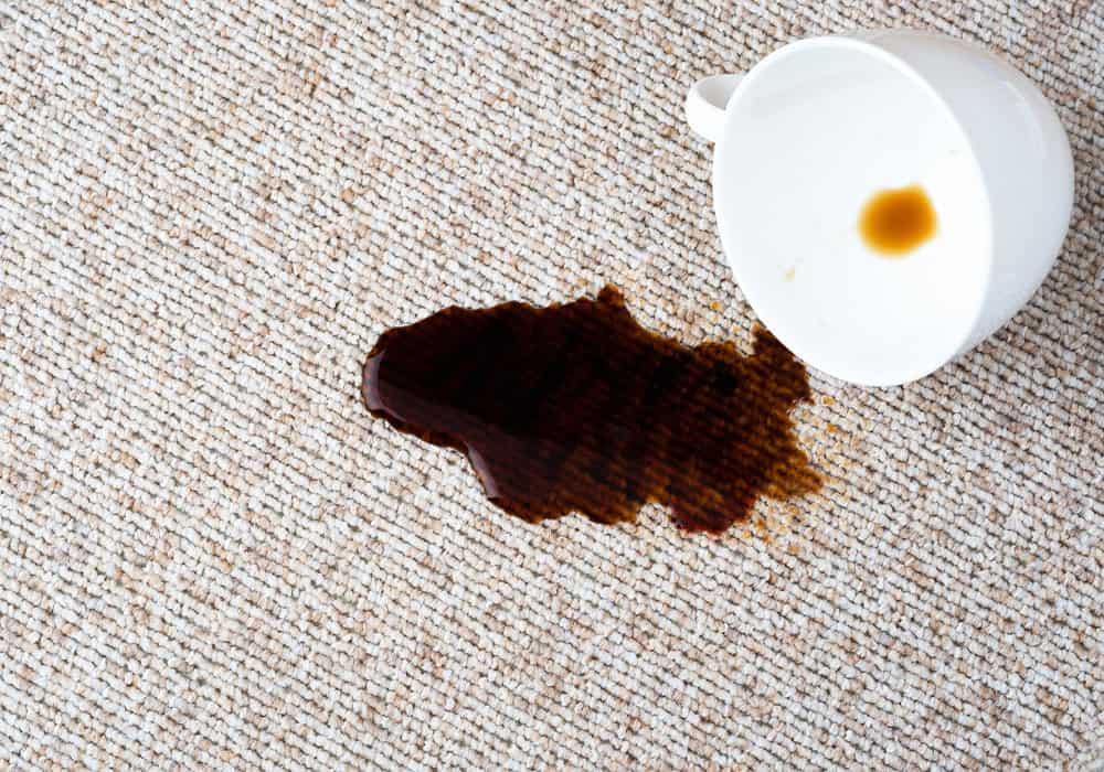 Coffee spilled on a carpet without stain protection