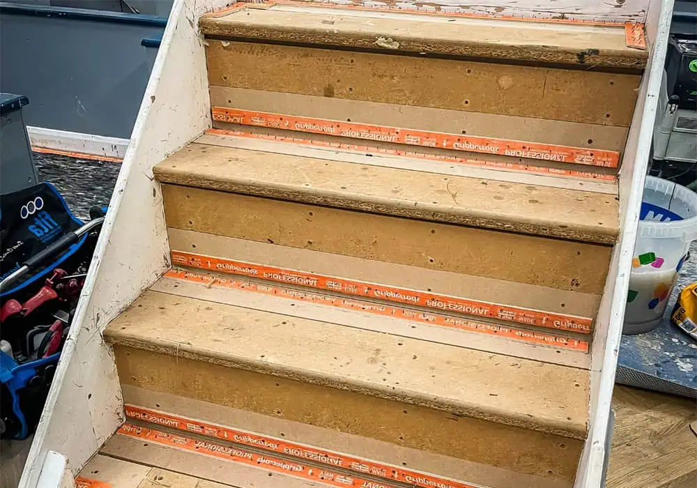 Carpet gripper installed on straight stairs