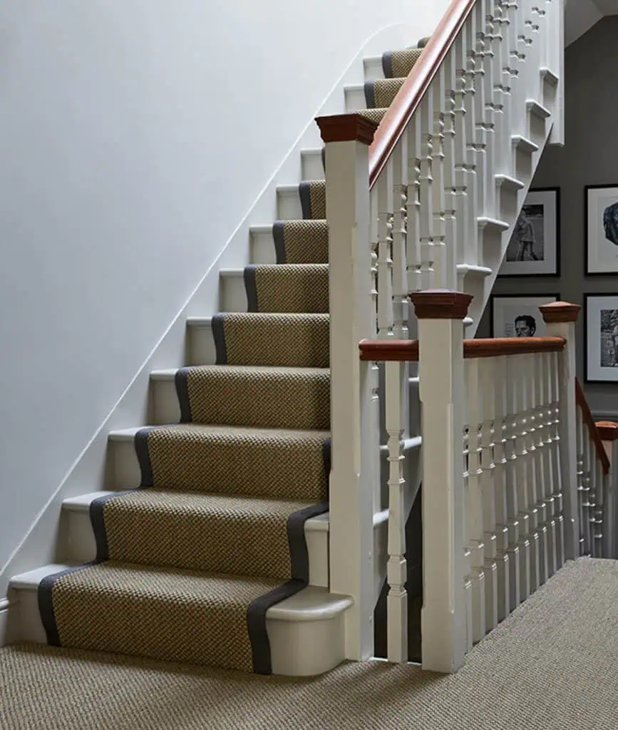 Staircase with a carpet runner and underlay installed